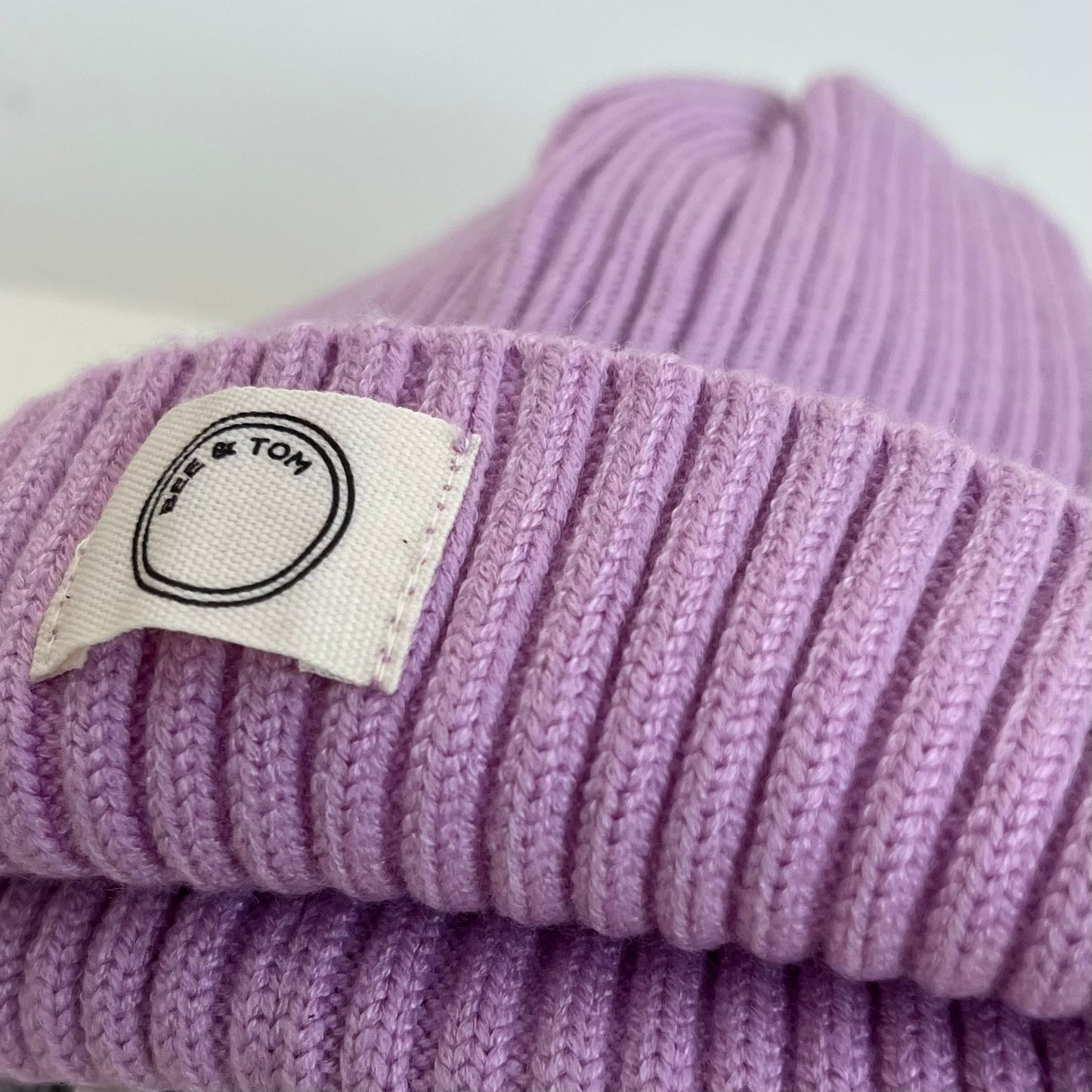 The cotton essential tracksuit (pink) & beanie (lilac)